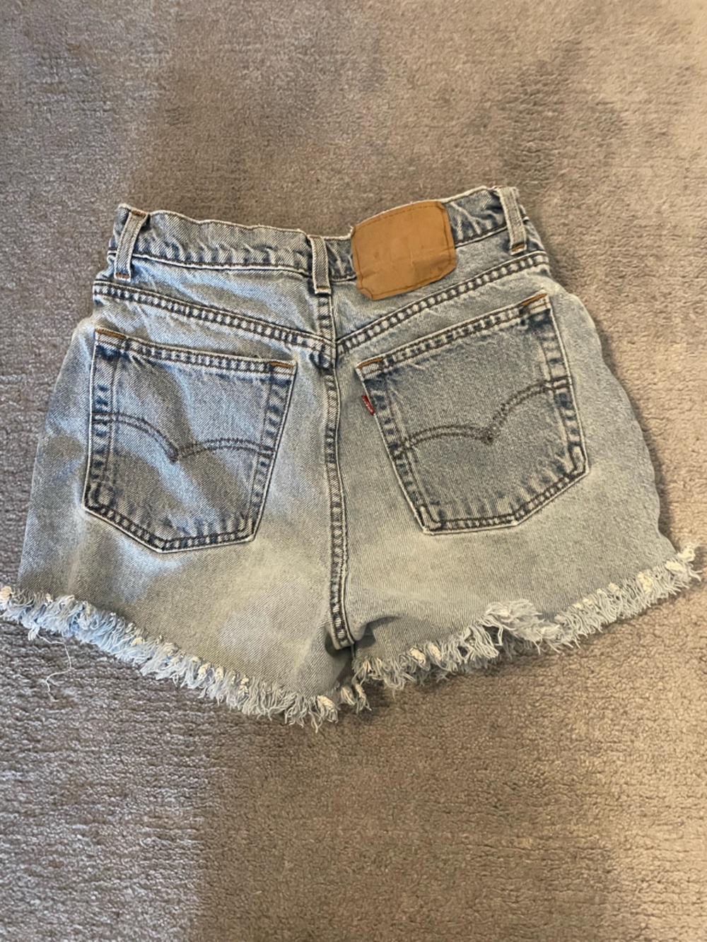 Vintage Levi's Light Blue Frayed Hem High-Rise Denim Shorts